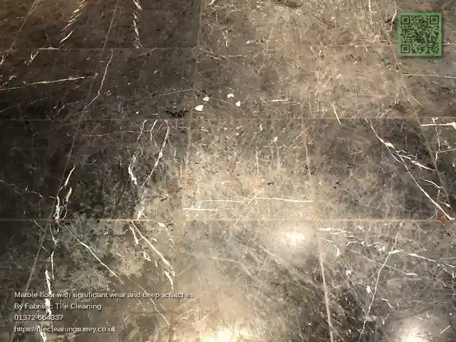 worn and scratched marble surface that needs grinding